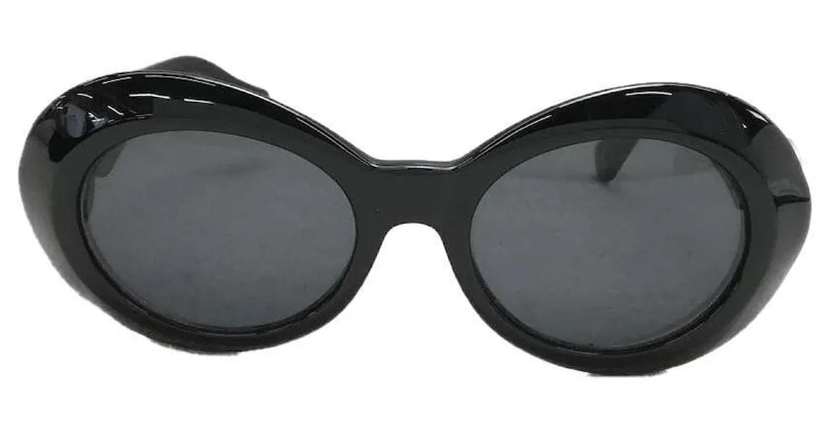 **Gafas de sol con montura ovalada en negro de Gianni Versace 
